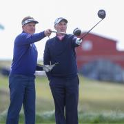 RIVALS: Newport's Phillip Price, right, with defending Senior Open champion Paul Broadhurst at Royal Porthcawl. Picture: Steve Pope - Sportingwales
