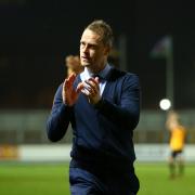 TARGET: Newport County manager Michael Flynn applauds the fans after Saturday's win over Colchester United. Picture: Huw Evans Agency
