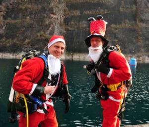 SANTAS IN THE SWIM: Ray Phillips, right, from Blaenavon, with Richard Brown, from Malpas