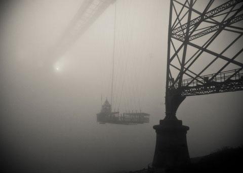 Seeing the Transporter Bridge gondola vanishing into the fog was an incredibly visceral experience. I took the picture about 7.45am. You can see the sun trying to break through the mist as well. A wonderful way to  start my day! Duncan Macphee