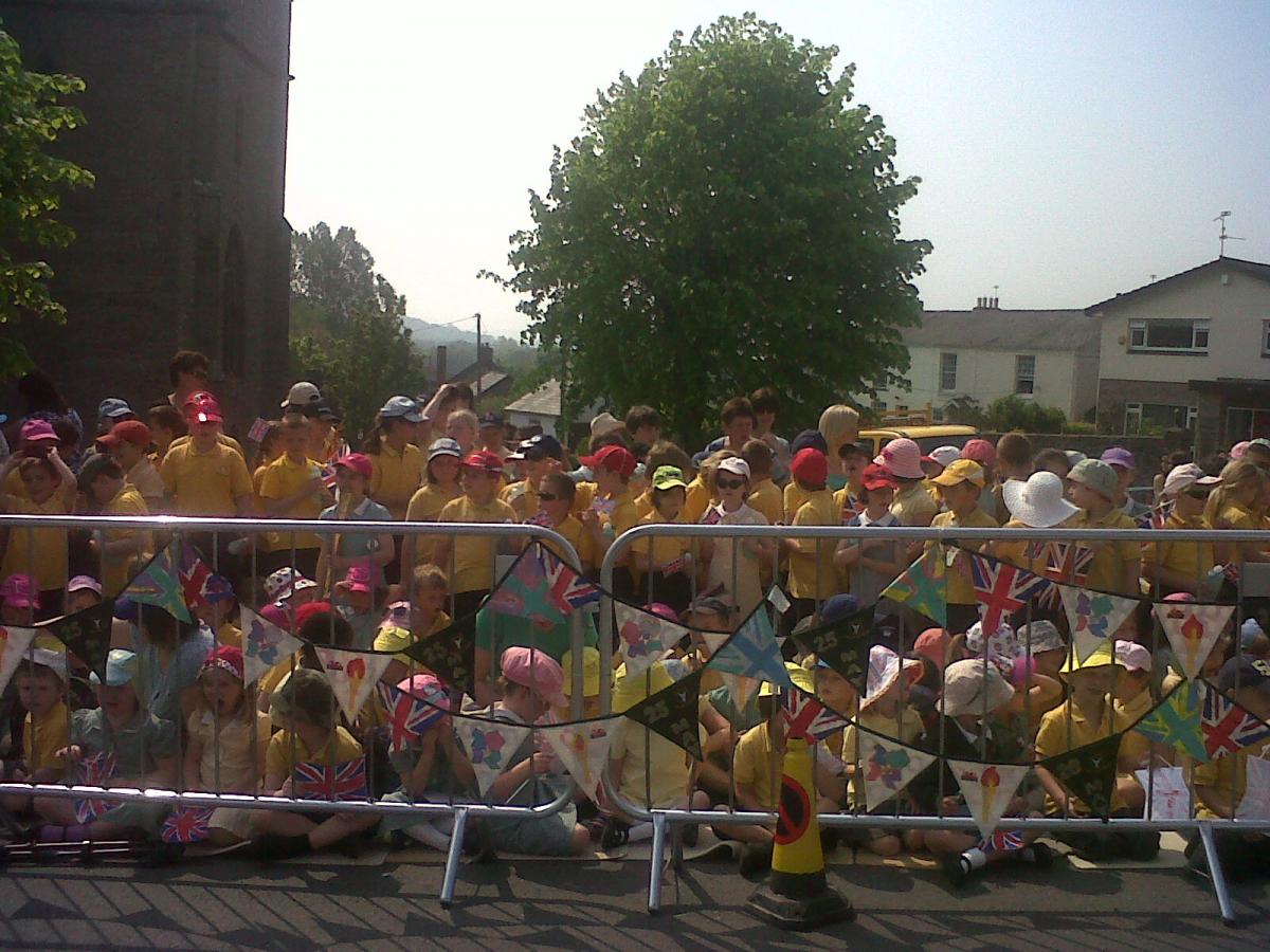 YOUNGSTERS wait for the torch in Raglan. From Argus reader Sian Richardson.