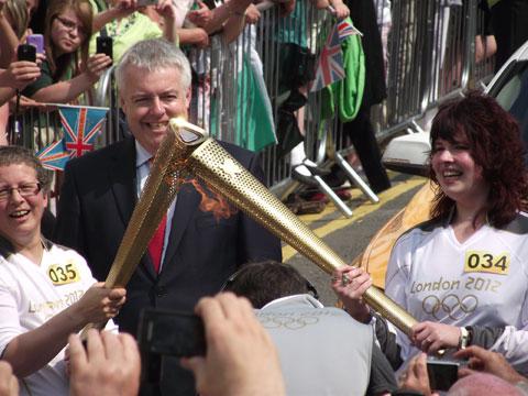 The exchanging of the torches with First Minister Carwyn Jones. From Christine Palmer.