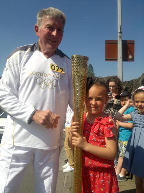 Jasmine Gibbons, 10 and Layla Gibbons, six at the Olympic torch relay. From Nathan Gibbons.