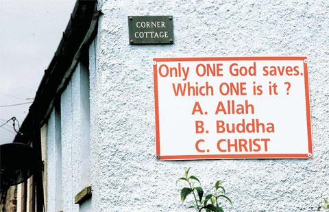 THE BIG QUESTION: A sign on the side of a cottage in Cefn Walk, near High Cross, Newport Picture:
MIKE LEWIS ML_13073