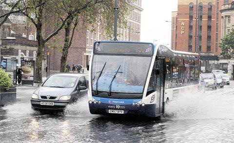 TORRENTIAL RAIN: Drivers had to be extra careful when driving down Queensway in Newport on
Saturday after heavy downpours caused flooding outside Newport train station.