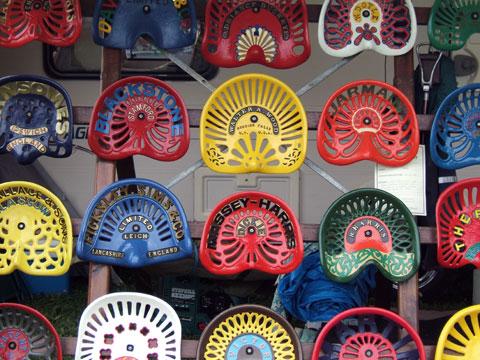 Colourful tractor seats on display at Abergavenny Steam Fair, by David James