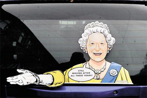STILL WAVING: ‘The Queen’ pictured on the back of a van in a Newport street ML_13317
Picture: MIKE LEWIS