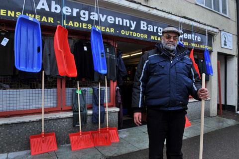 Mr Joginder Singh from Abergavenny Bargains where Sledges and Snow Shovels have been selling fast.