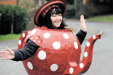 OUT AND A SPOUT: Rebecca Blount dressed in a teapot outfit in Abergavenny ML_13597 Picture: MIKE LEWIS