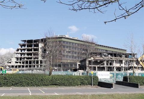 DISAPPEARING FAST: The former County Hall in Cwmbran being demolished by Alastair McDougall