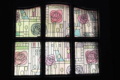 ROSE-TINTED GLASS: Patterned window-panes in a front door ML_13924 Picture: MIKE LEWIS