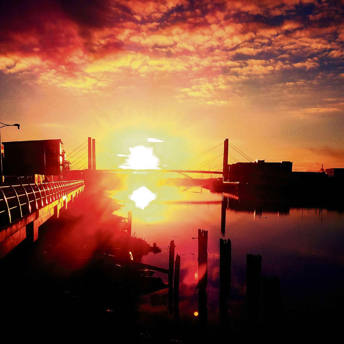@southwalesargus READER PIC: 28.01.14: Paul Lavender captured this shot of the sun rising over George Street Bridge in Newport