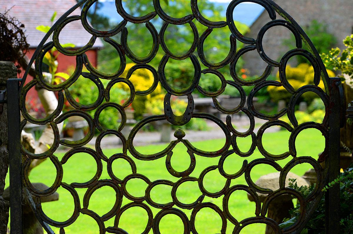 @southwalesargus PIC OF THE DAY: Gate to a garden at Usk Castle made from horse shoes Pic: MIKE LEWIS 