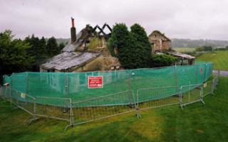 FENCED OFF: The farmhouse and area cordoned off in readiness for work