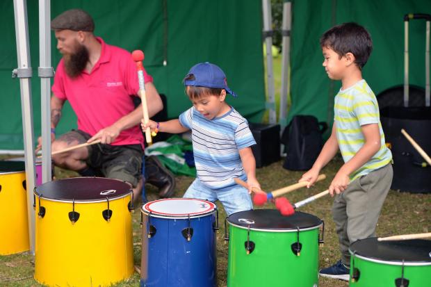 South Wales Argus: Thomas and Liam Hall playing some samba rhythms at the 2019 Party in the Park. Picture: christinsleyphotography.co.uk