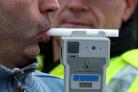 PICTURE POSED BY MODEL ..File photo dated 03/12/14 of a man demonstrating breathalyser equipment asthree in four motorists would like to see a lower drink-drive legal limit in England and Wales, according to a survey. PRESS ASSOCIATION Photo. Issue date: