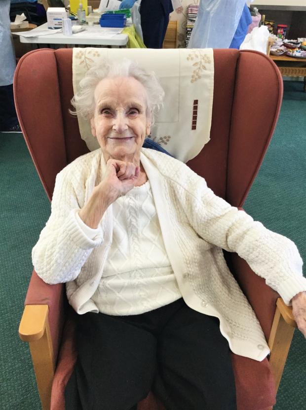 South Wales Argus: Winifred Williams,102, after receiving her coronavirus vaccine at Arthur Jenkins Care Home in Blaenavon. Picture: Hafod