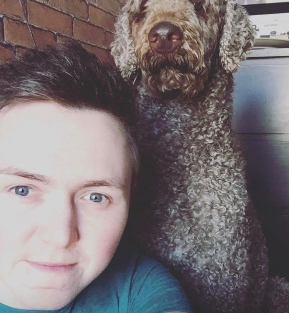 Niall Worgan-Davies with the family dog, Doodles