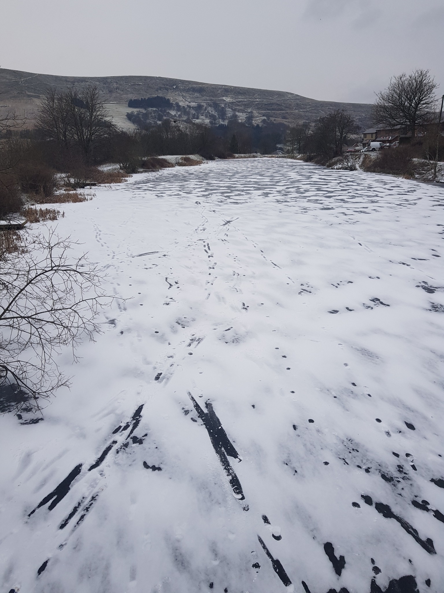 Footprints of children who have been playing on iced over ponds in Blaina. Picture: Blaenau Gwent Officers (Twitter)