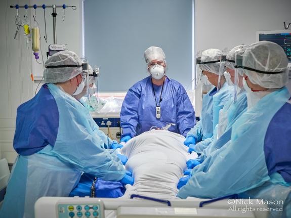 South Wales Argus: A proning team prepares to prone a patient with severe respiratory failure. Proned patients are left lying on their front for at least 16 hours a day South Wales Argus: A proning team prepares to prone a patient with severe respiratory failure. Proned patients are left lying on their front for at least 16 hours a day