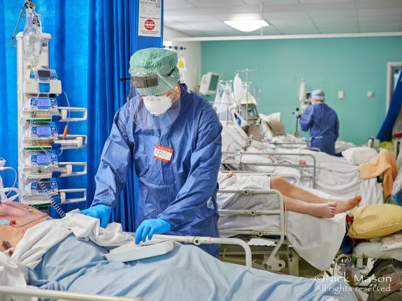 South Wales Argus: Beds between beds. At one point the Royal Gwent ICU was operating at around 300% of its normal capacity necessitating placing beds in between the normal bed spaces to create room for ventilated patients. South Wales Argus: Beds between beds. At one point the Royal Gwent ICU was operating at around 300% of its normal capacity necessitating placing beds in between the normal bed spaces to create room for ventilated patients.