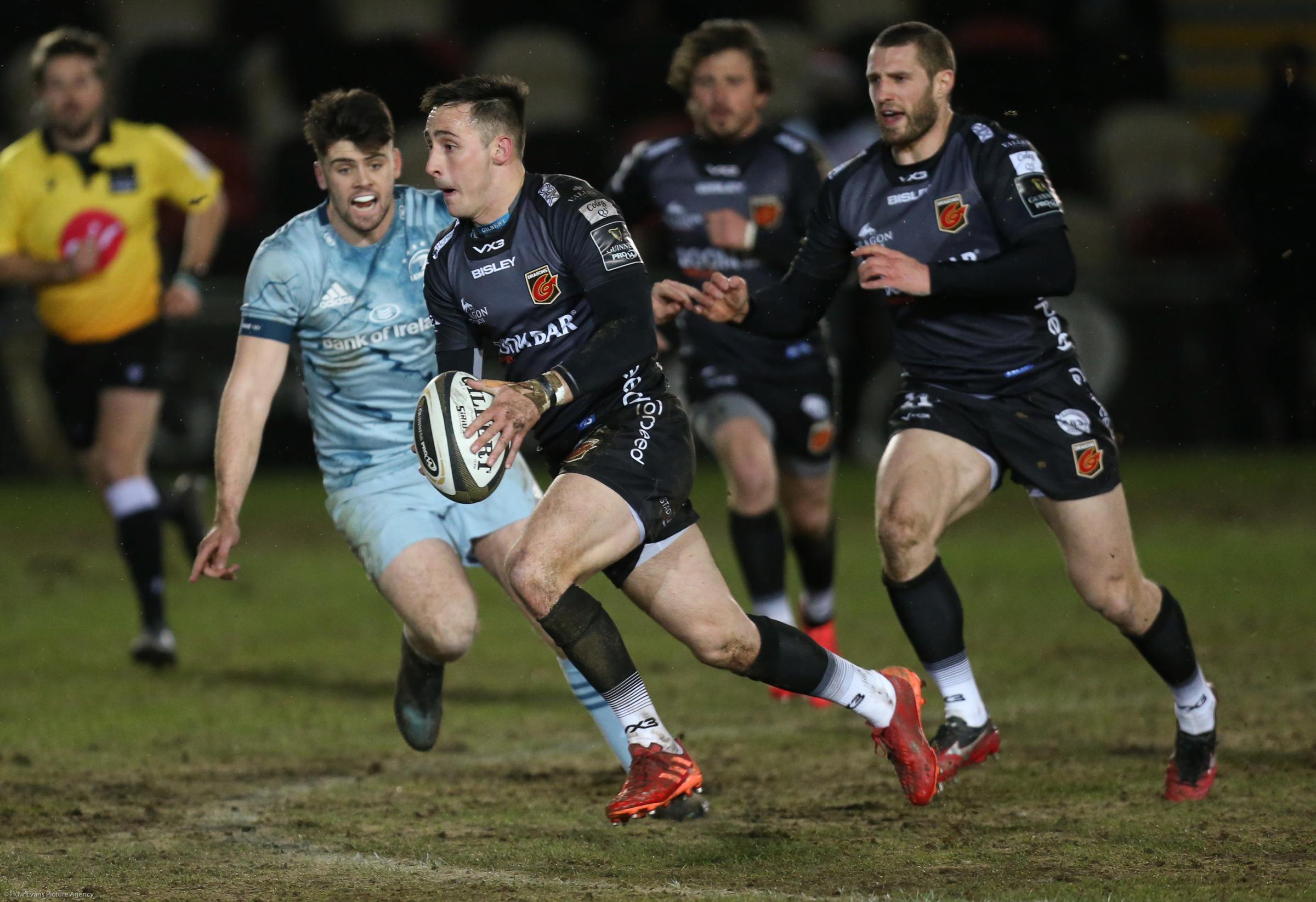 Sam Davies on the run for the Dragons against Leinster