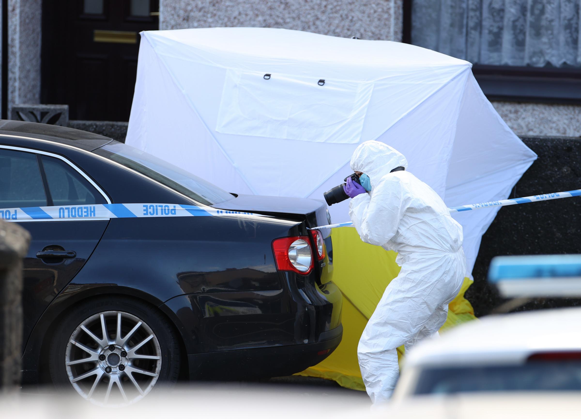 05.03.21 Police Incident, Rhonnda -Police forensic examiners at the scene of serious incident involving a number of casualties outside the Blue Sky takeaway on Baglan Street in Treorchy, Rhondda, South Wales