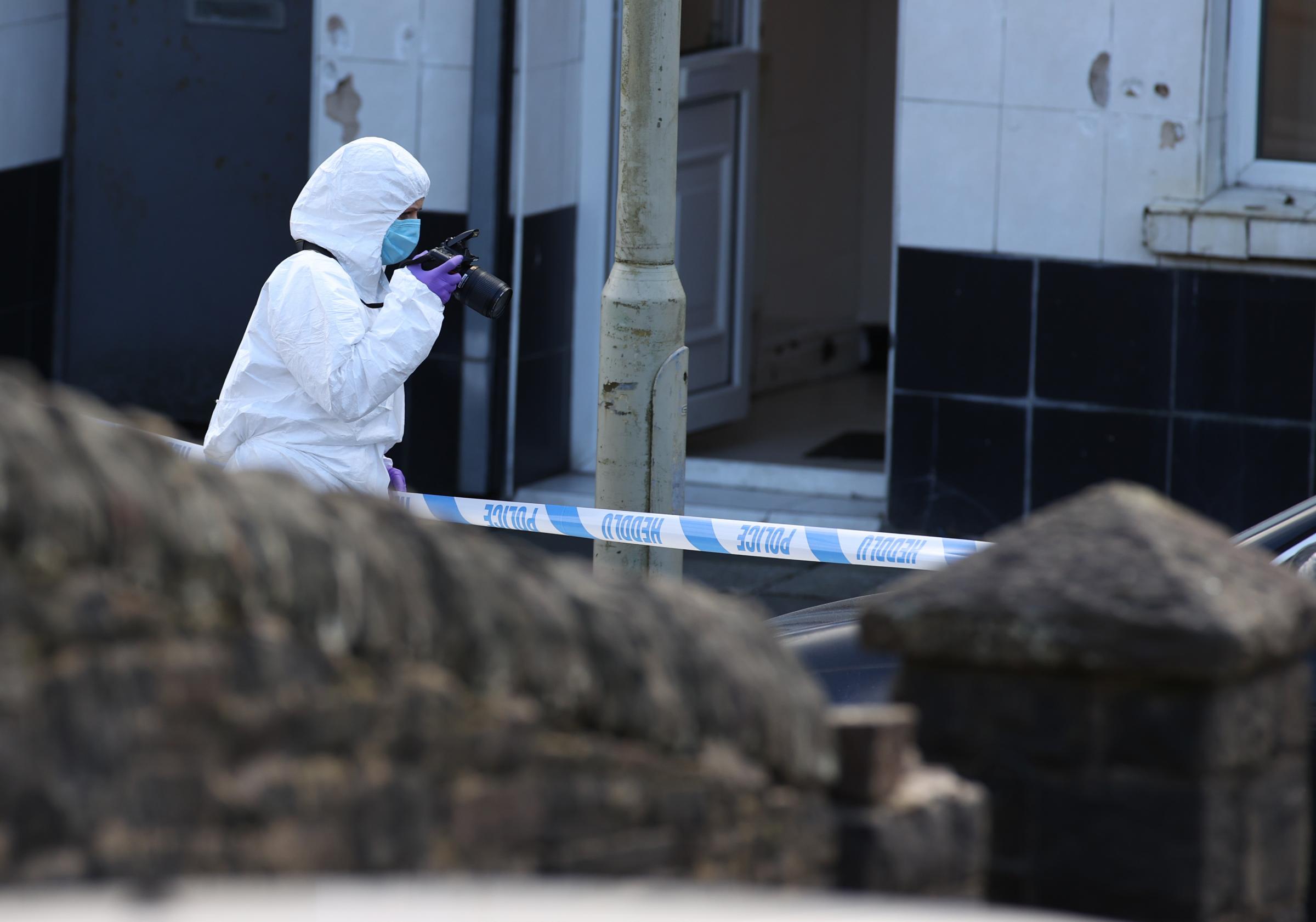 05.03.21 Police Incident, Rhonnda -Police forensic examiners at the scene of serious incident involving a number of casualties outside the Blue Sky takeaway on Baglan Street in Treorchy, Rhondda, South Wales. Credit: Huw Evans Picture Agency