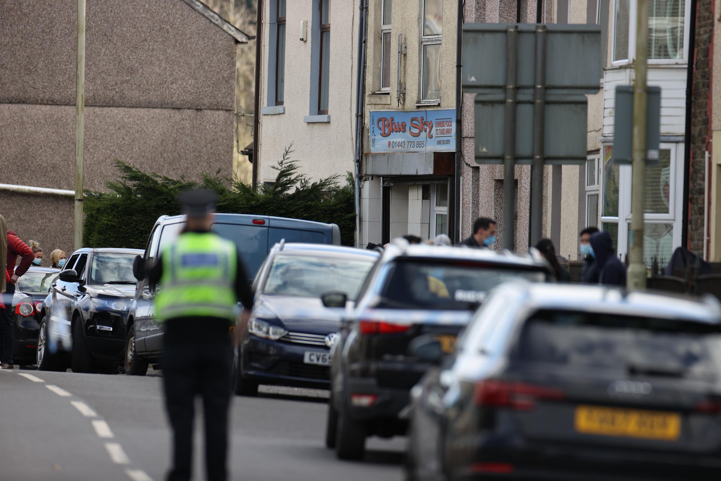 05.03.21 Police Incident, Rhonnda -The police cordon off an area at the scene of serious incident involving a number of casualties outside the Blue Sky takeaway on Baglan Street in Treorchy, Rhondda, South Wales. Huw Evans Picture Agency