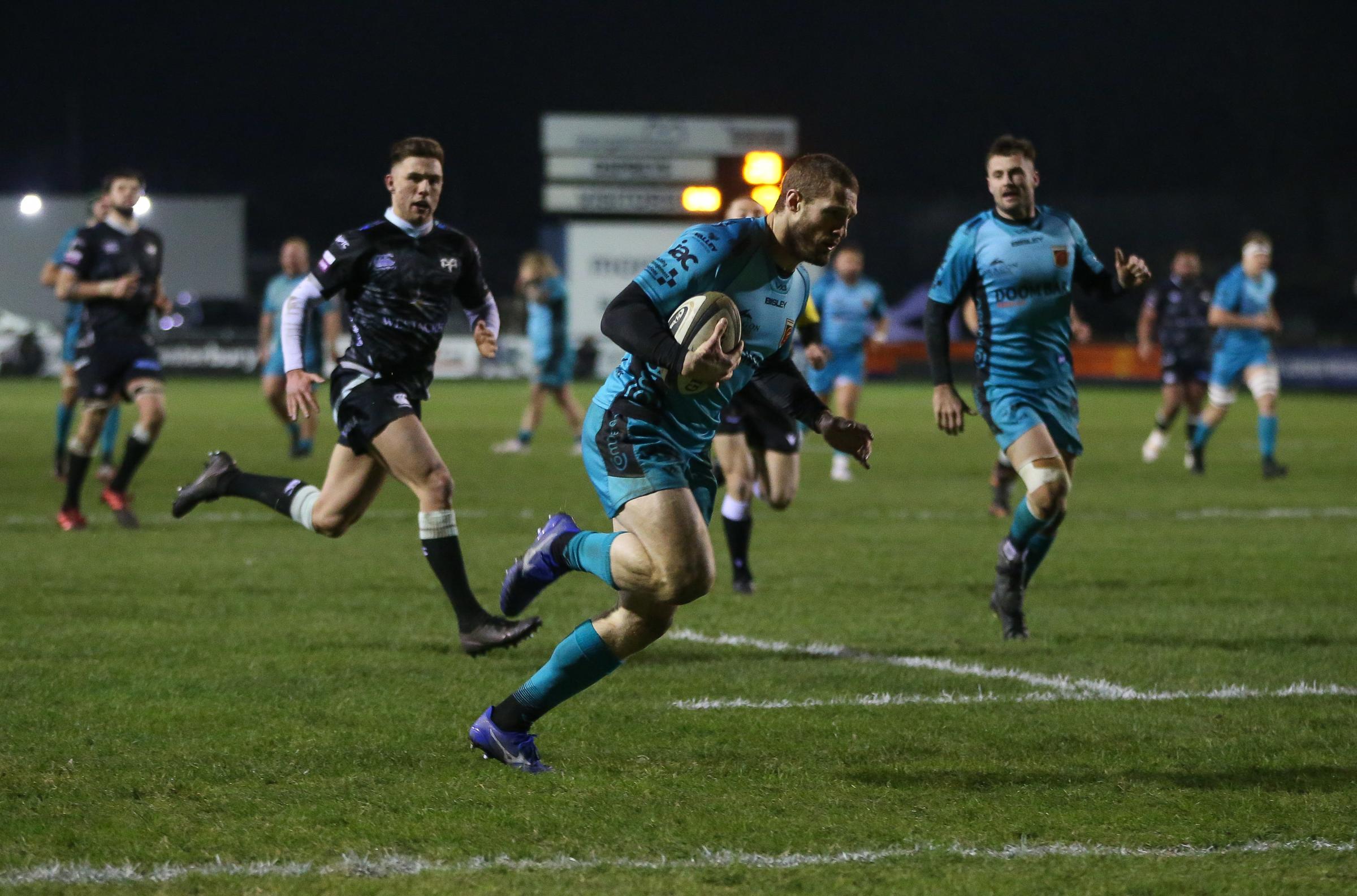 DOUBLE: Jonah Holmes crossed for two of the Dragons five tries against the Ospreys
