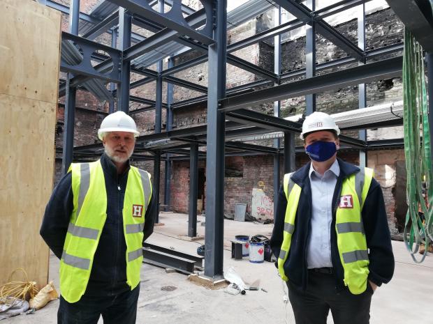 South Wales Argus: Pastor Andrew Cleverly (left) and Henstaff Construction's Gordon Brown at Bethel Community Church in Stow Hill, Newport.