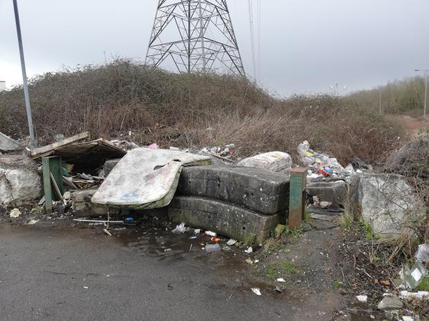South Wales Argus: Access to the road has been blocked, but people continue to dump waste at the former entrance. Picture: The National