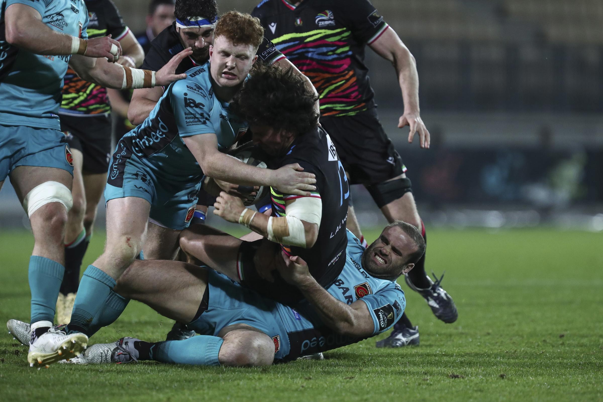 Aneurin Owen and Jamie Roberts in defence for the Dragons at Zebre