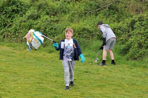 South Wales Argus: Idris Jones with a beer box found on a litter pick South Wales Argus: Idris Jones with a beer box found on a litter pick