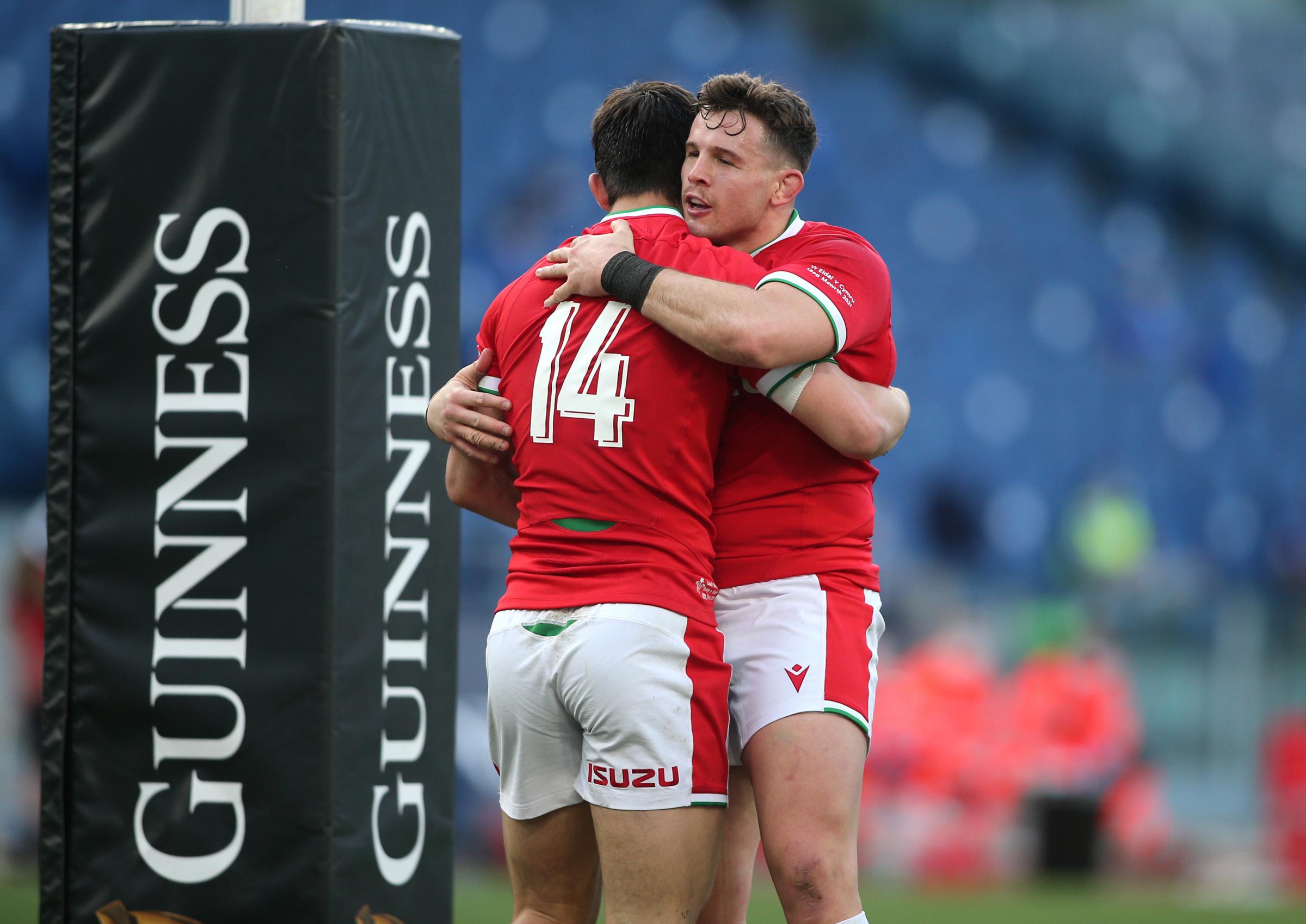 Wales Louis Rees-Zammit (left) celebrates scoring their seventh try with teammate Elliot Dee during the Guinness Six Nations match at Stadio Olimpico, Rome