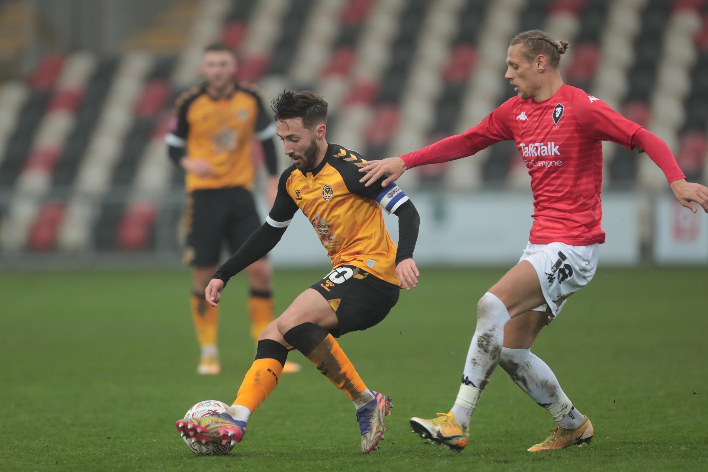 28.11.20 - Newport County v Salford City - FA Cup Second Round - Josh Sheehan of Newport County with Oscar Threlkeld of Salford City ...
