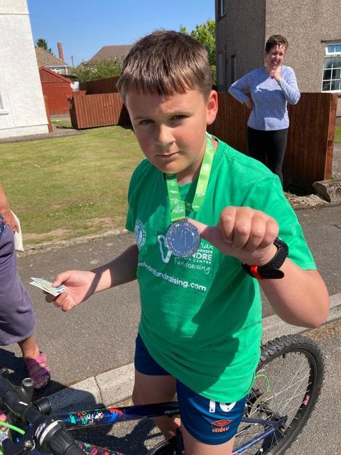 Jaxon Darknell with his Velindre medal after completing his challenge. Picture: Karen Darknell.