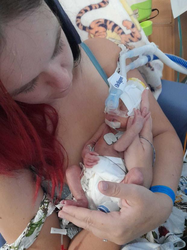 South Wales Argus: Mum Jessica Hamblin cradles her premature newborn daughter Rhianwen