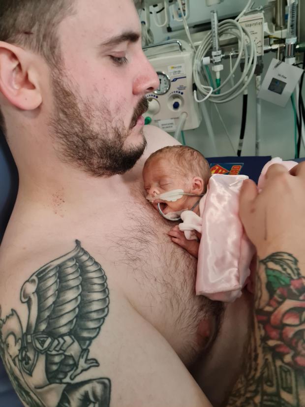 South Wales Argus: Dad Ryan Rees gets a cuddle with his tiny daughter Rhianwen