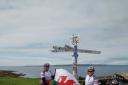 Nathan and Andy Reeks at John O'Groats having completed their epic journey