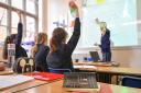 Some schools in Wales may have to return to online learning because of rising levels of the Omicron variant, the Welsh Government has said. Photo: PA
