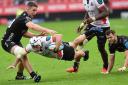 CHALLENGE: Henco van Wyk on the charge for the Lions against the Dragons last season