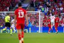 Armenia's Grant-Leon Ranos scores their side's third goal of the game during the UEFA Euro 2024 Qualifying Group D match at the Cardiff City Stadium,