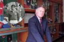 David Watkins in the old trophy room at Newport RFC and inset in his playing days for Wales
