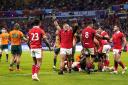 JOY: Wales celebrate thumping Australia at the World Cup