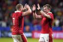 JOB DONE: Jac Morgan and Nick Tompkins celebrate Wales' win against Australia