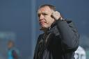 THRILLED: Graham Coughlan salutes the fans after Newport County's win at Morecambe