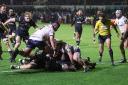 POWER: Ox Nche smashes his way over for the Sharks against the Dragons