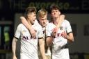 JOY: County's James Clarke, Will Evans and Seb Palmer-Houlden celebrate