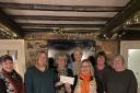 Diane and Rachel, representatives of a Llanidloes Youth Club receiving their donation from the Ladies Day committee members Michelle Brown, Helen Woosnam, Steph Wheeler, Tracey Lawrence and Carole Evans.
